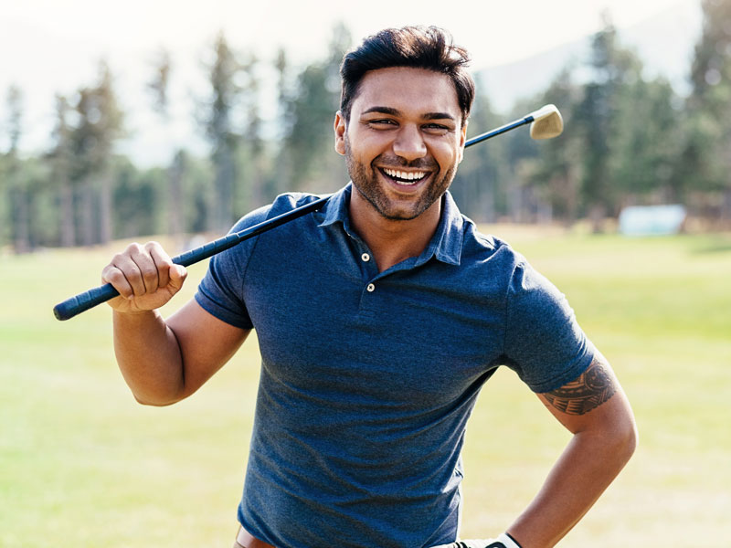 man golfing
